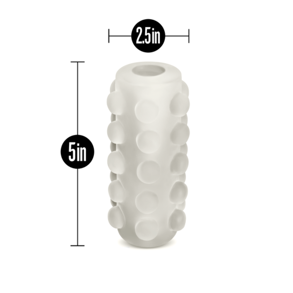 A white textured cylinder with raised dots, measuring 5 inches long and 2.5 inches wide.