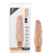 Beige realistic waterproof multi-speed vibrator, 7 inches long, in packaging.