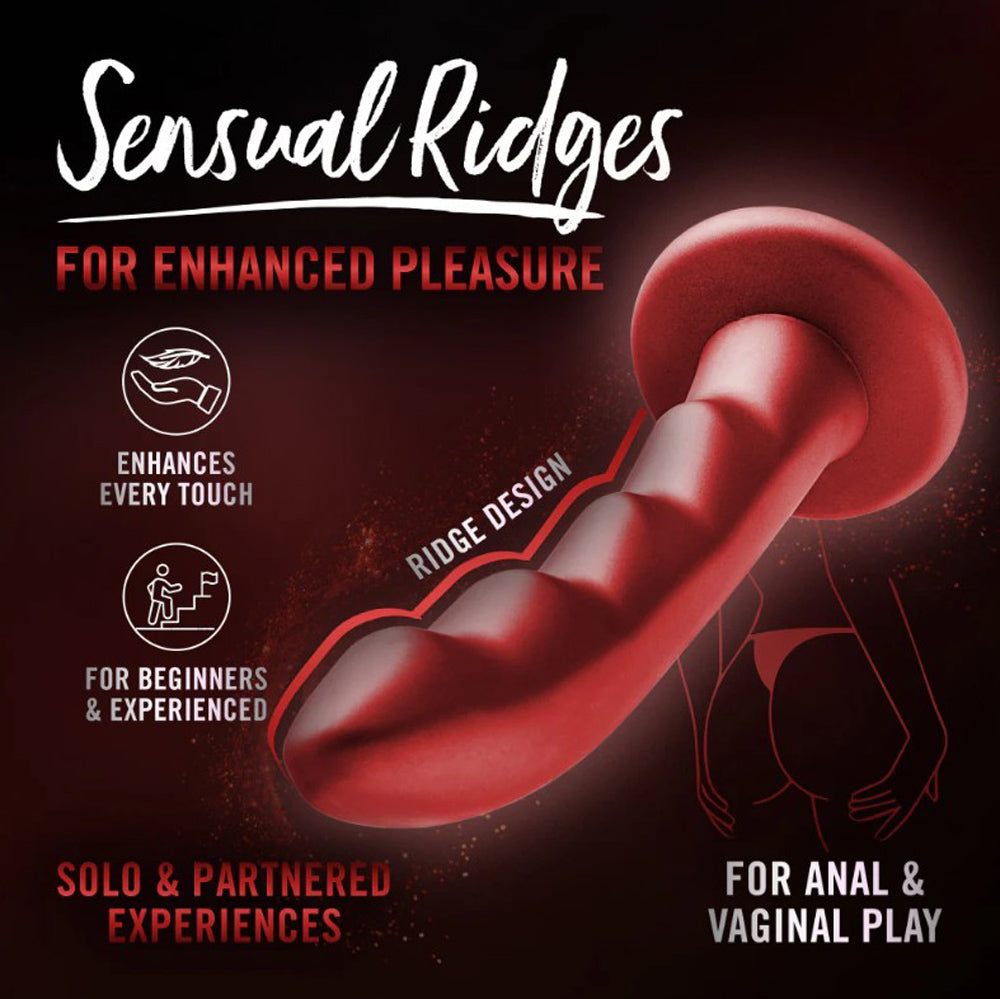 Red silicone dildo with ridges for enhanced pleasure and anal or vaginal play.