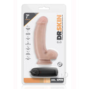 7-inch blush gyrating multispeed G-spot dildo with suction cup base in packaging.