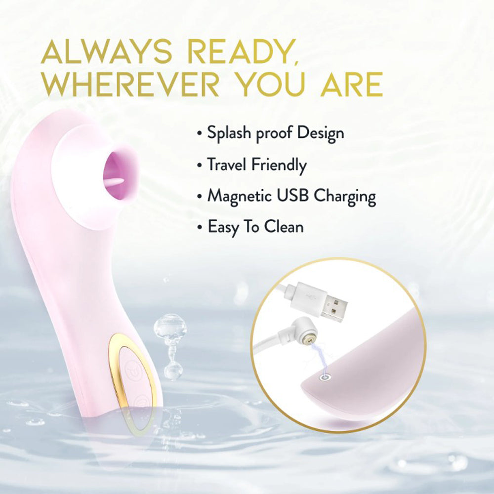 A pink clitoral massager with a gold accent, shown in water with text about its features.