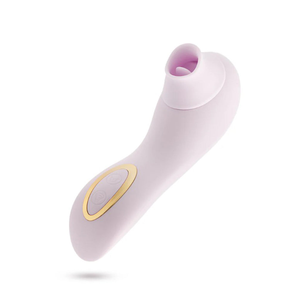A blush silicone clitoral suction and fluttering massager with gold accents.