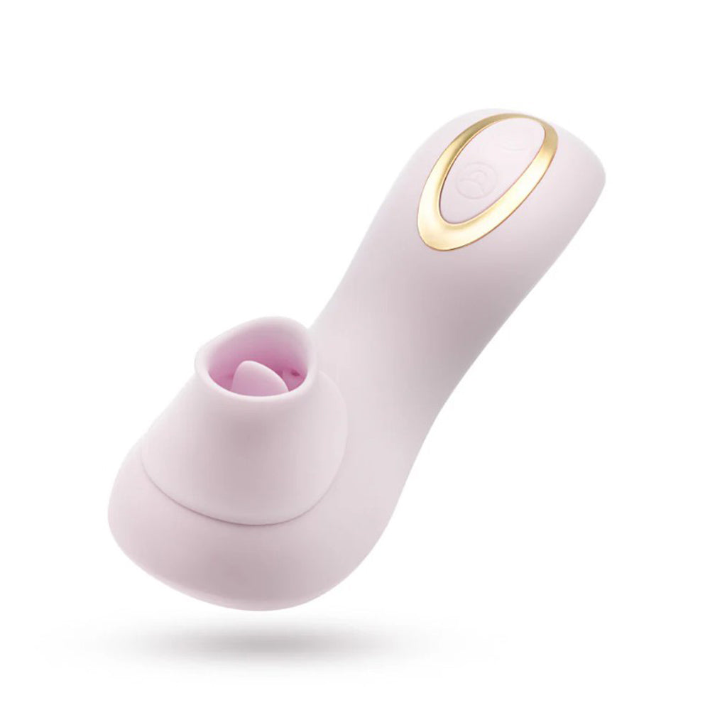 A blush pink clitoral massager with a gold accent and a textured opening.