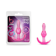 Pink curvy anal plug with tapered design and contoured base.