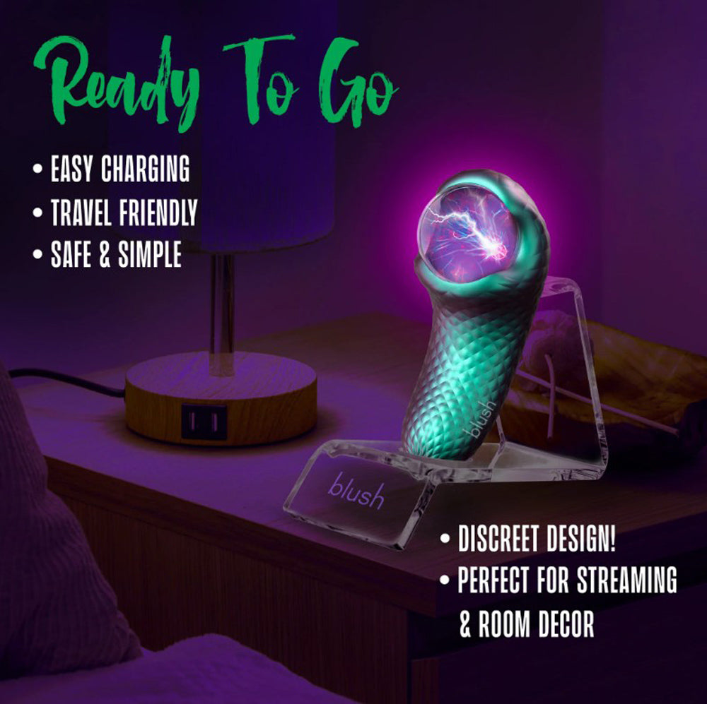 A teal textured vibrator with a glowing plasma orb on a clear stand.