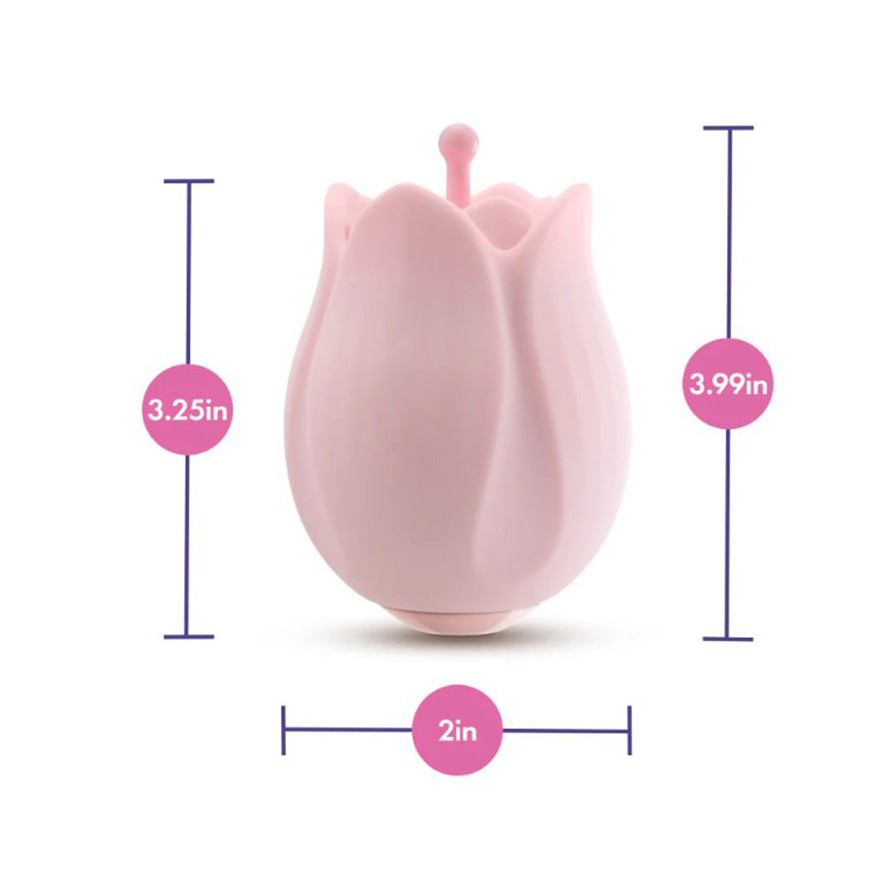 Pink tulip-shaped silicone massager with dimensions indicated.