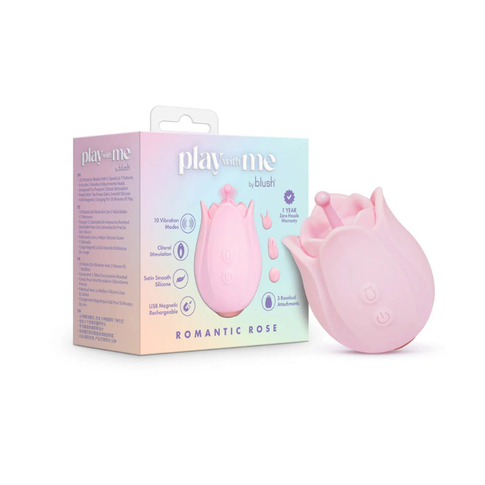 Pink rose-shaped clitoral massager with USB charging and attachments.
