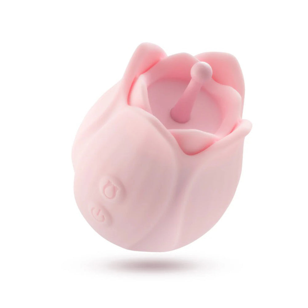 A pink, rose-shaped silicone clitoral massager with a raised nub inside.
