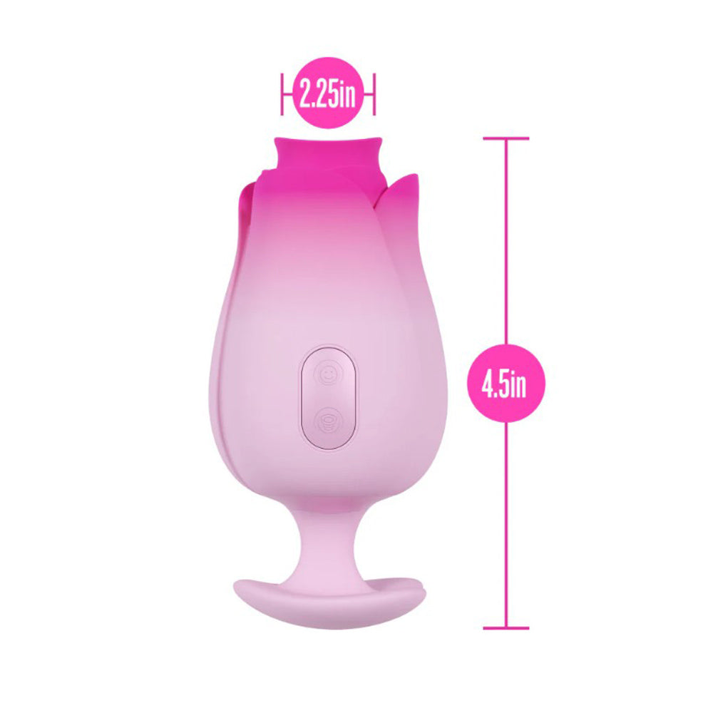 Pink silicone massager shaped like a tulip with dimensions indicated.