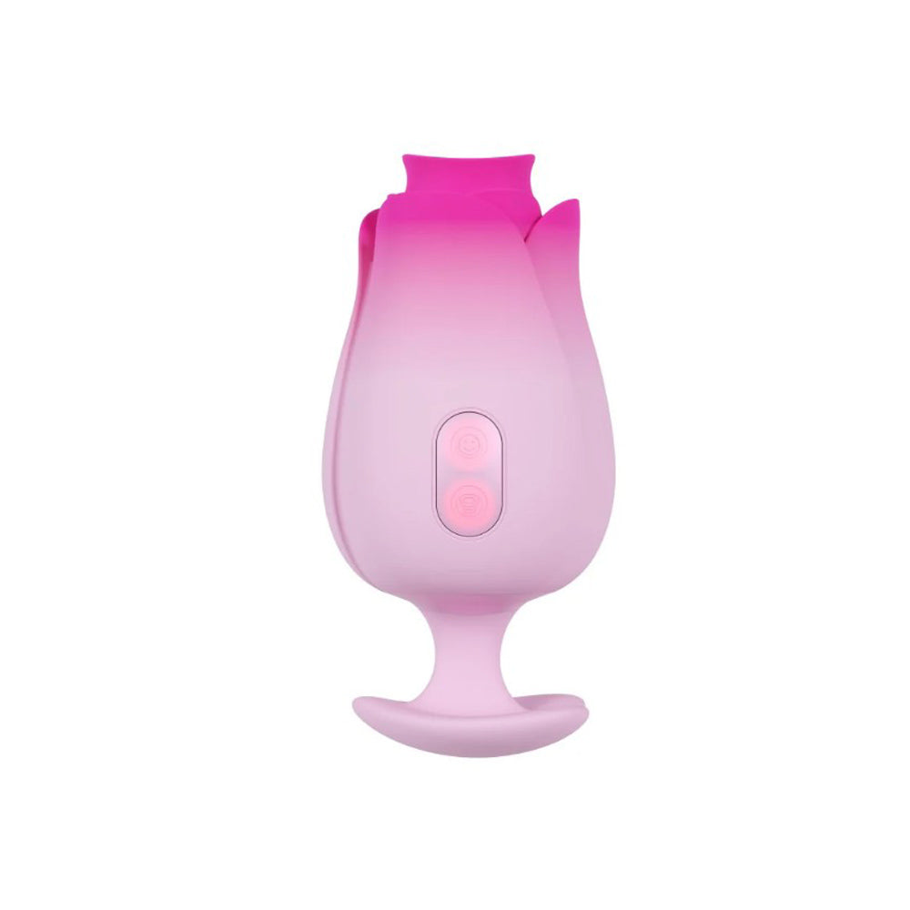 Pink tulip-shaped silicone massager with two illuminated buttons.