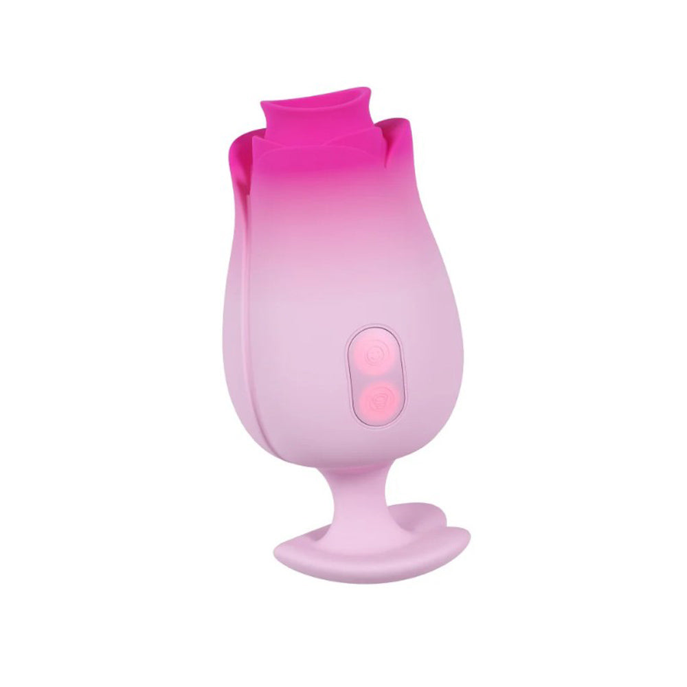 Pink silicone massager shaped like a tulip with two illuminated buttons.
