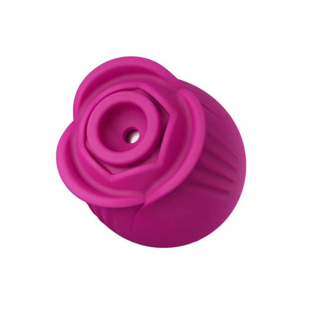 A pink rose-shaped silicone massager with ribbed sides.