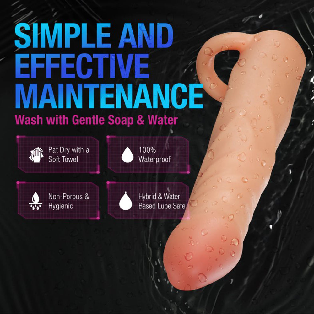A blush-colored silicone penis extender with maintenance instructions.