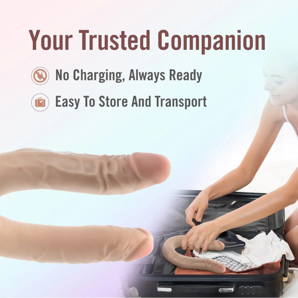 A realistic, beige, dual-ended dildo being placed into a suitcase.