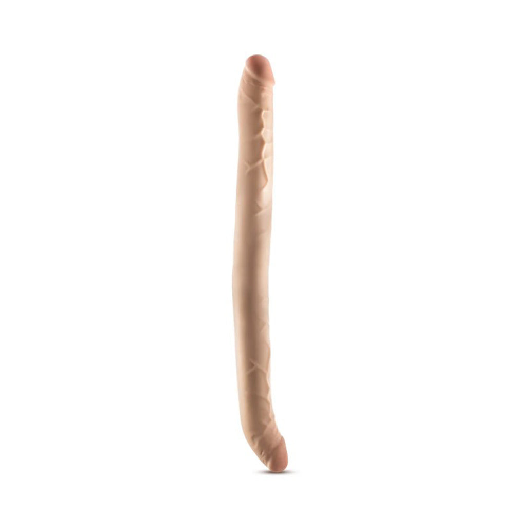 A long, beige, double-ended dildo with textured details.