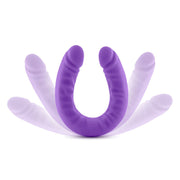 Purple U-shaped double dildo with a slim profile.