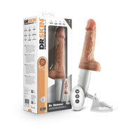 Boxed realistic thrusting dildo with remote, warming feature, and suction base.