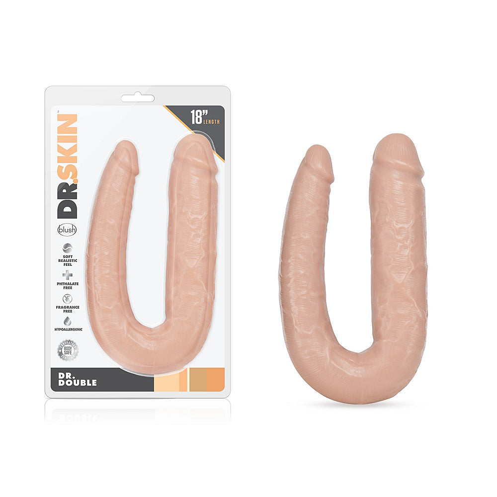 A double-ended, U-shaped, vanilla-colored dildo with a realistic feel.