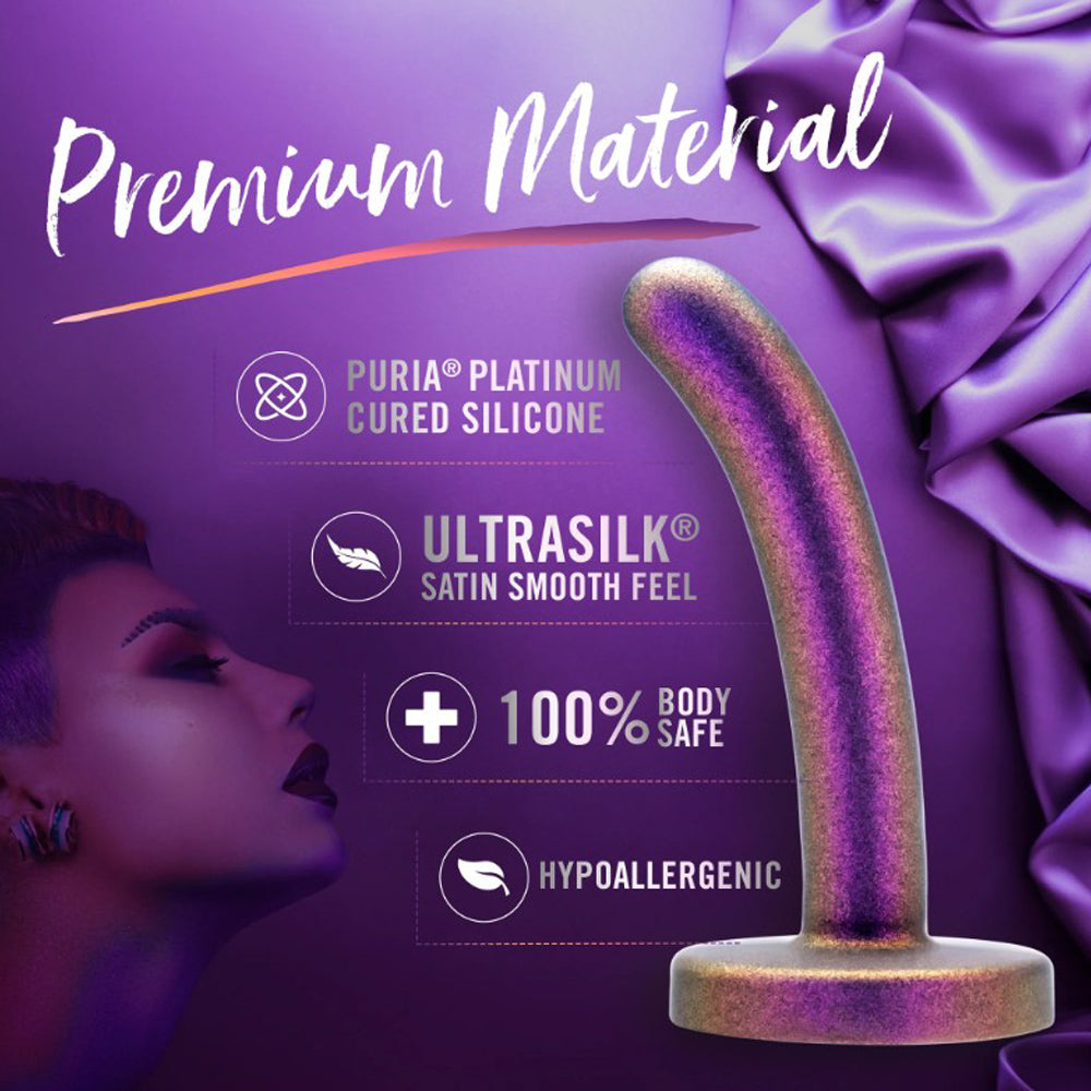 A purple and gold silicone dildo with text highlighting its premium material and smooth finish.