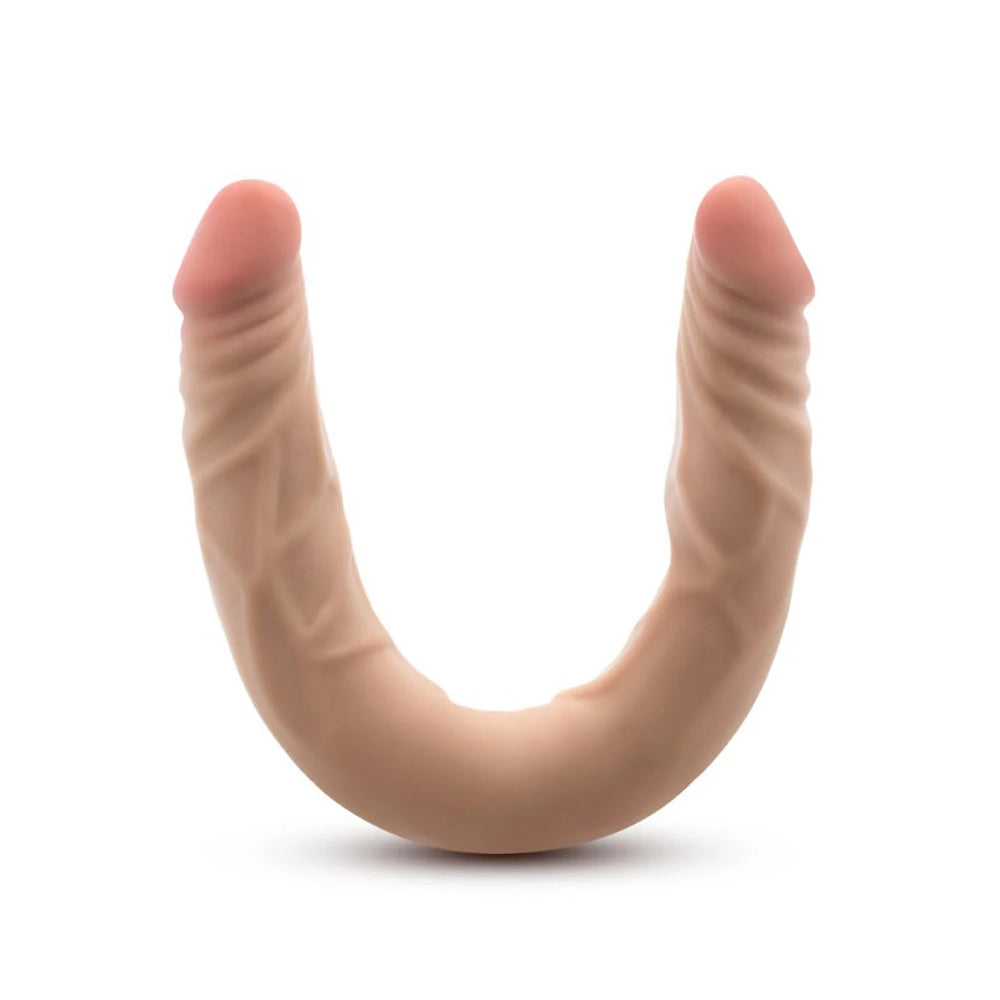A 14-inch posable double-ended realistic TPE dildo in flesh tone.