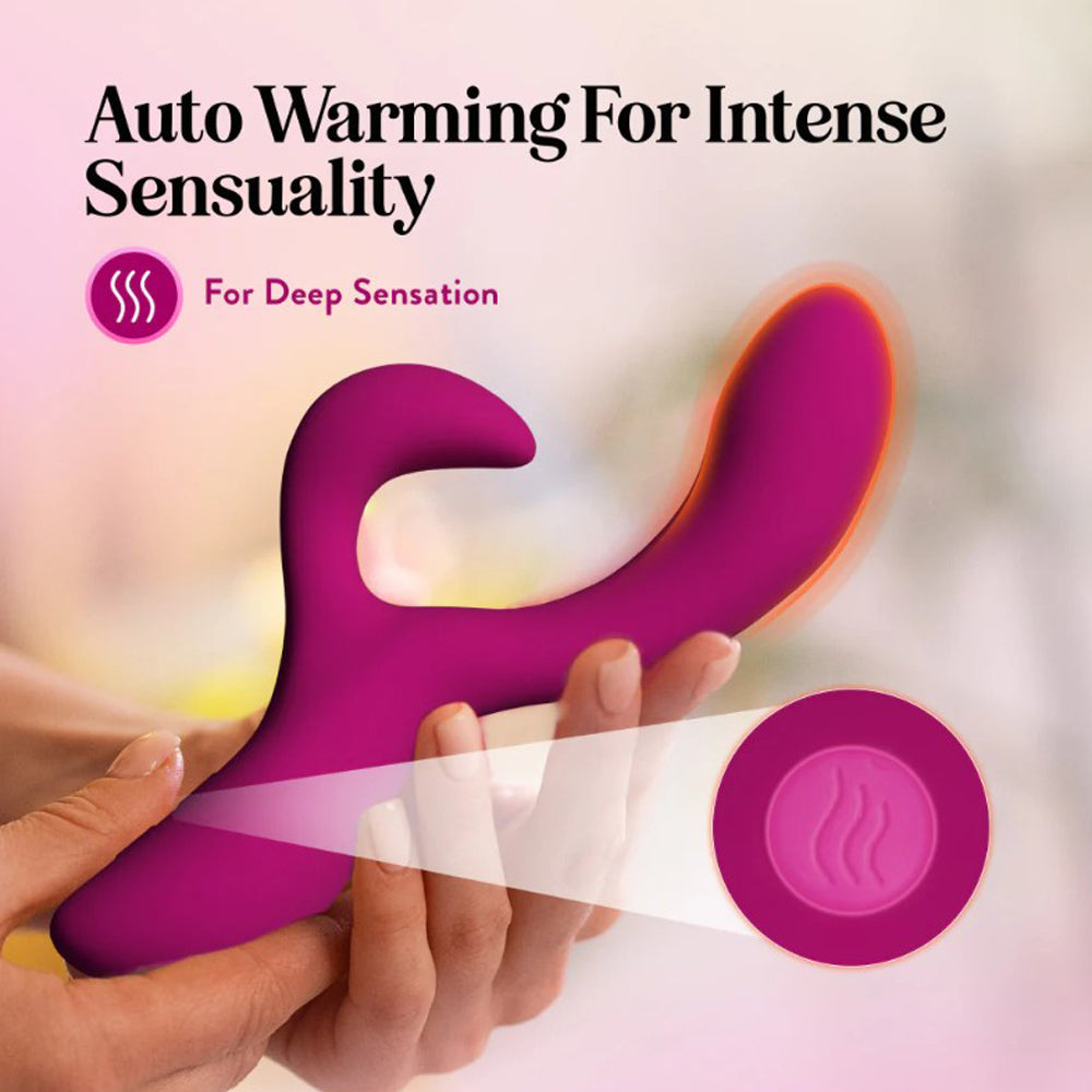 A pink rabbit vibrator with a warming feature and a button with wavy lines.