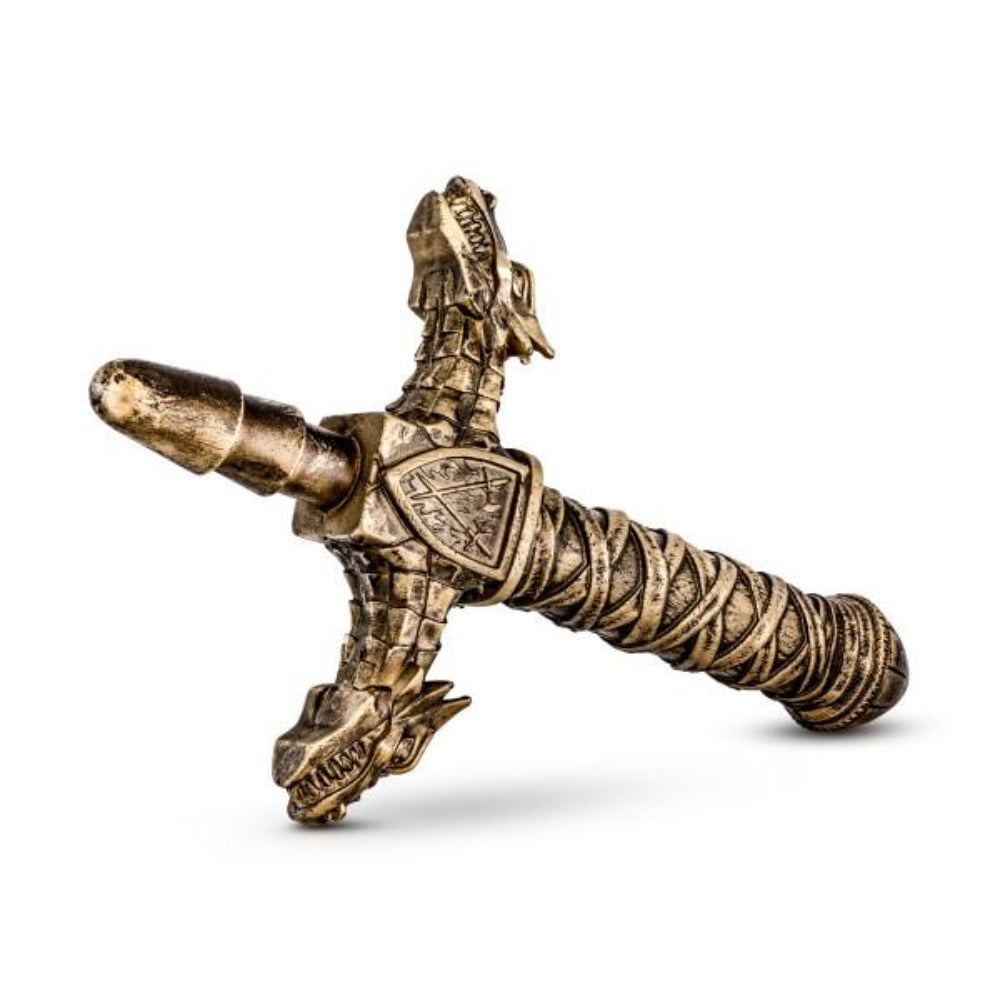Bronze dragon sword handle with intricate detailing.