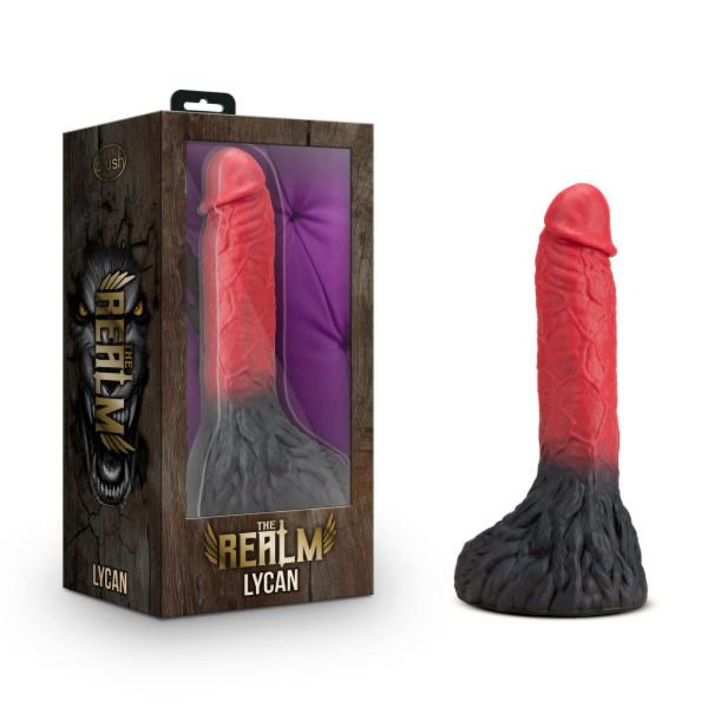 A red and black werewolf dildo in its packaging and displayed separately.