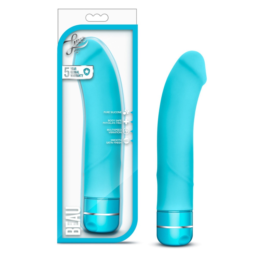 Teal silicone vibrator with dual motors for G-spot and clitoral stimulation.