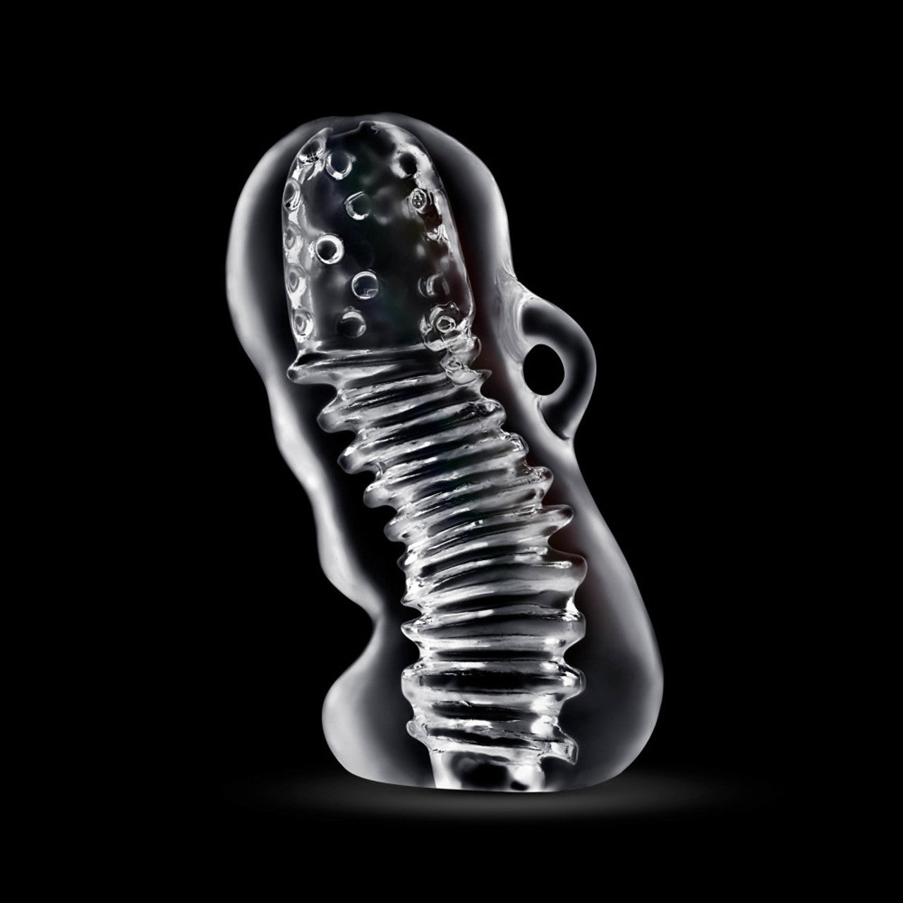 Clear textured stroker with a ribbed shaft and textured head.