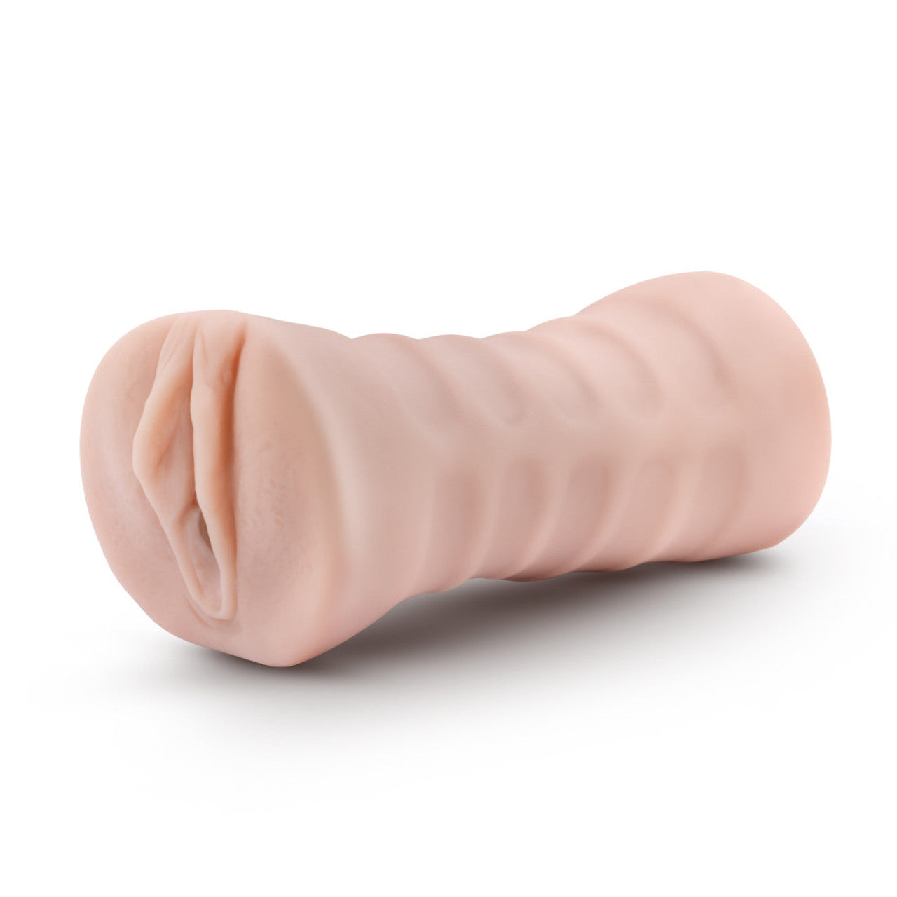 A pink vibrating male stroker with a textured interior and an open end.