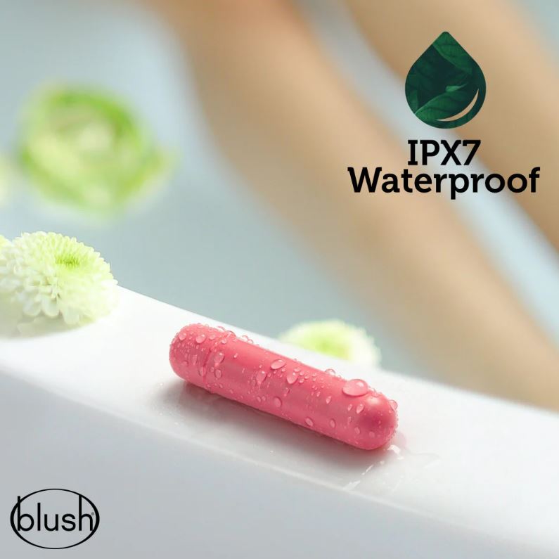 Pink waterproof bullet vibrator with water droplets.