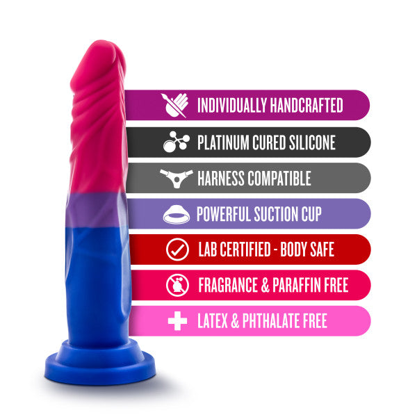 7.5-inch silicone dildo in pink and blue with suction cup base and feature labels.