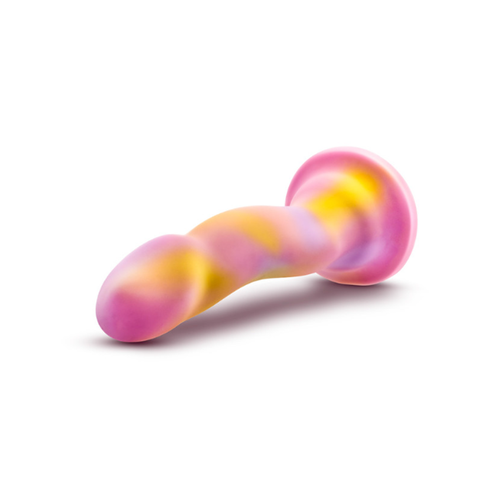 A pink, yellow, and purple swirled silicone dildo with a curved shaft and suction cup base.