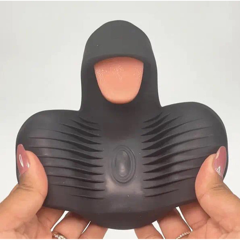 Black vibrating penis stimulator with ribbed texture and a pink tongue-like insert.