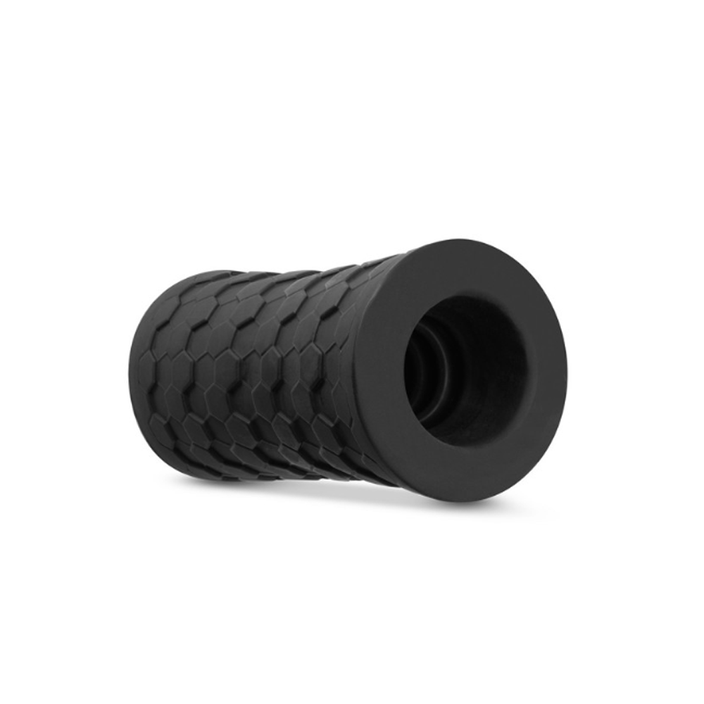 Black ribbed silicone stroker sleeve with a hexagonal pattern.