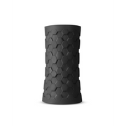 Black ribbed silicone stroker sleeve with a hexagonal pattern.