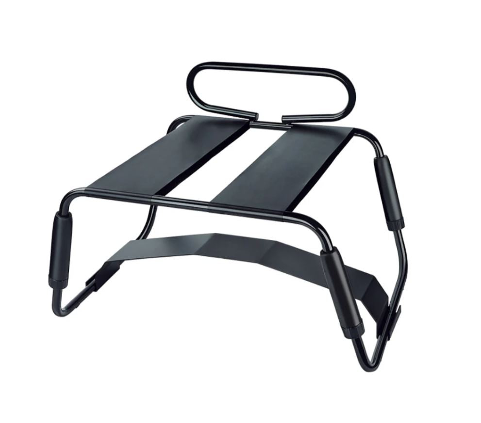 Black metal luggage rack with black straps and a curved handle.
