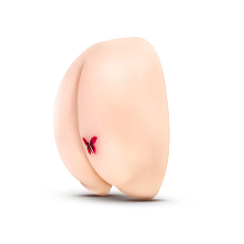 Pink X5 vibrating male stroker with dual ribbed canals and red butterfly tattoo.