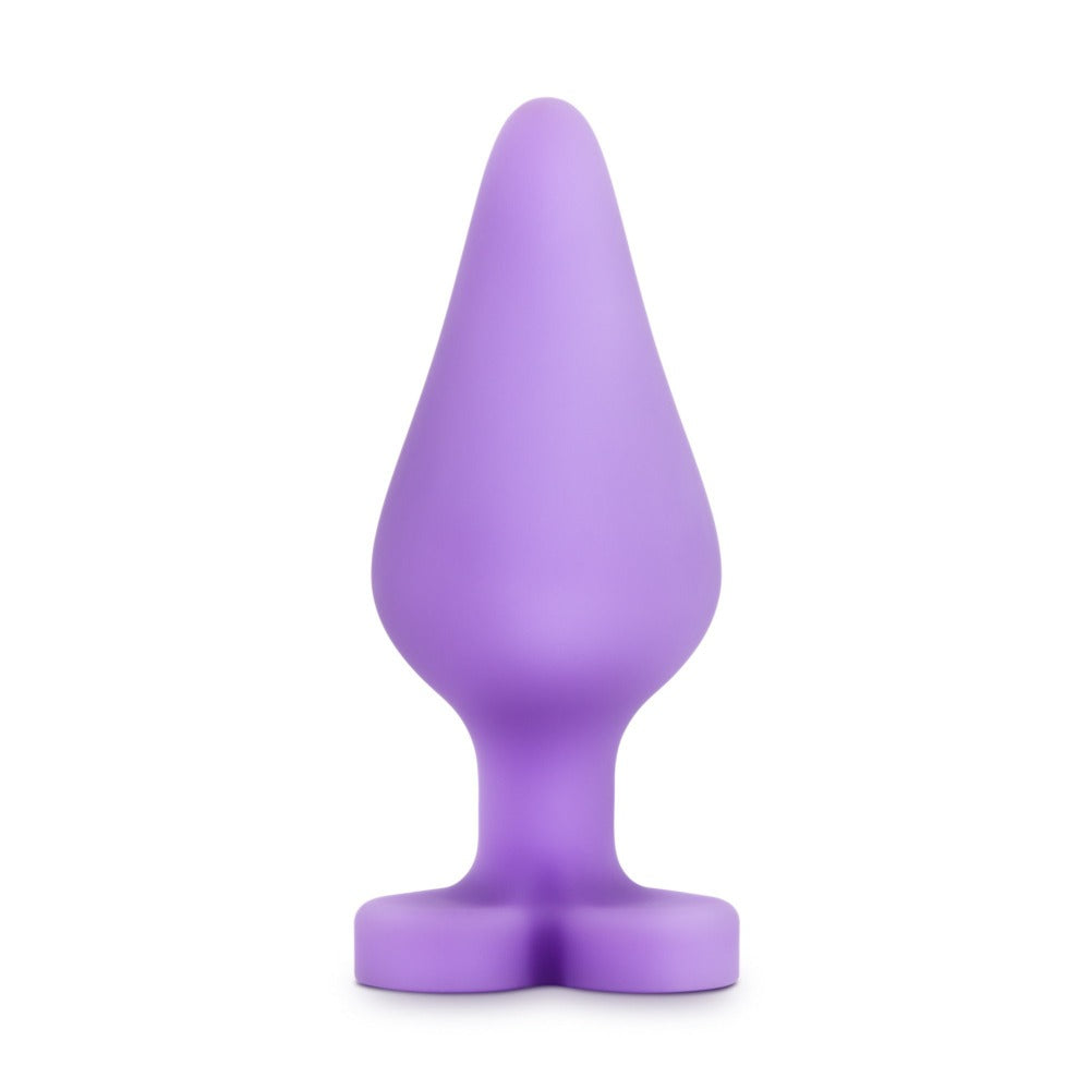 Purple silicone anal training plug with a heart-shaped base.