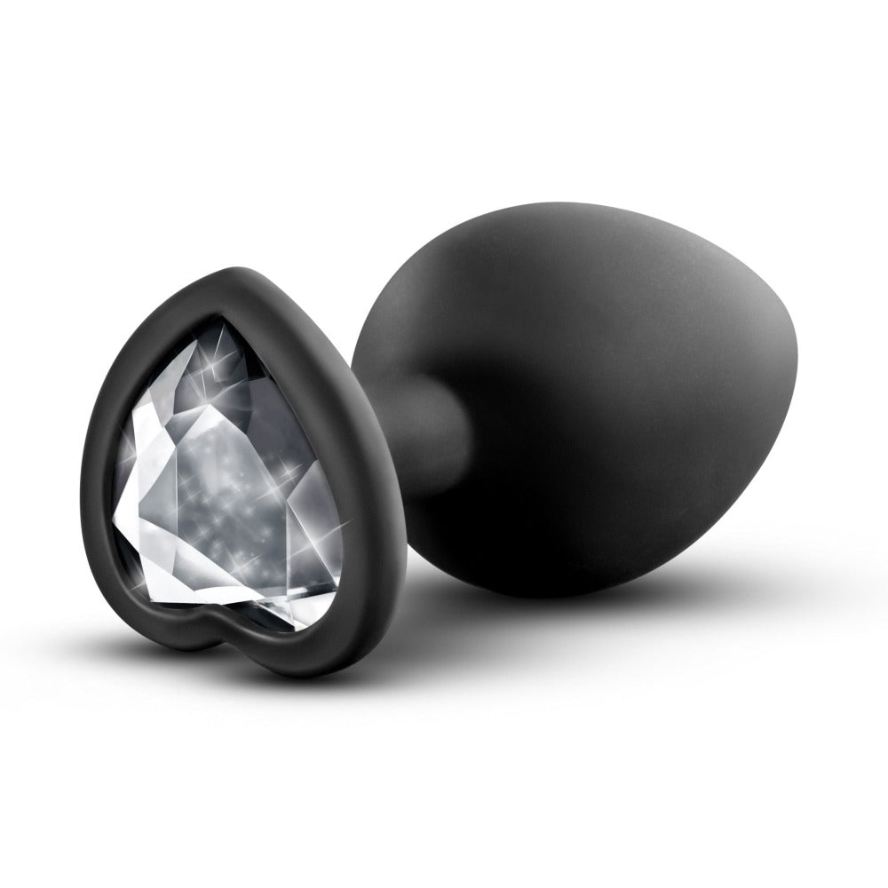 Black silicone anal plug with a heart-shaped gemstone.