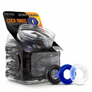 A display of 50 blush cock rings in black, blue, and white.