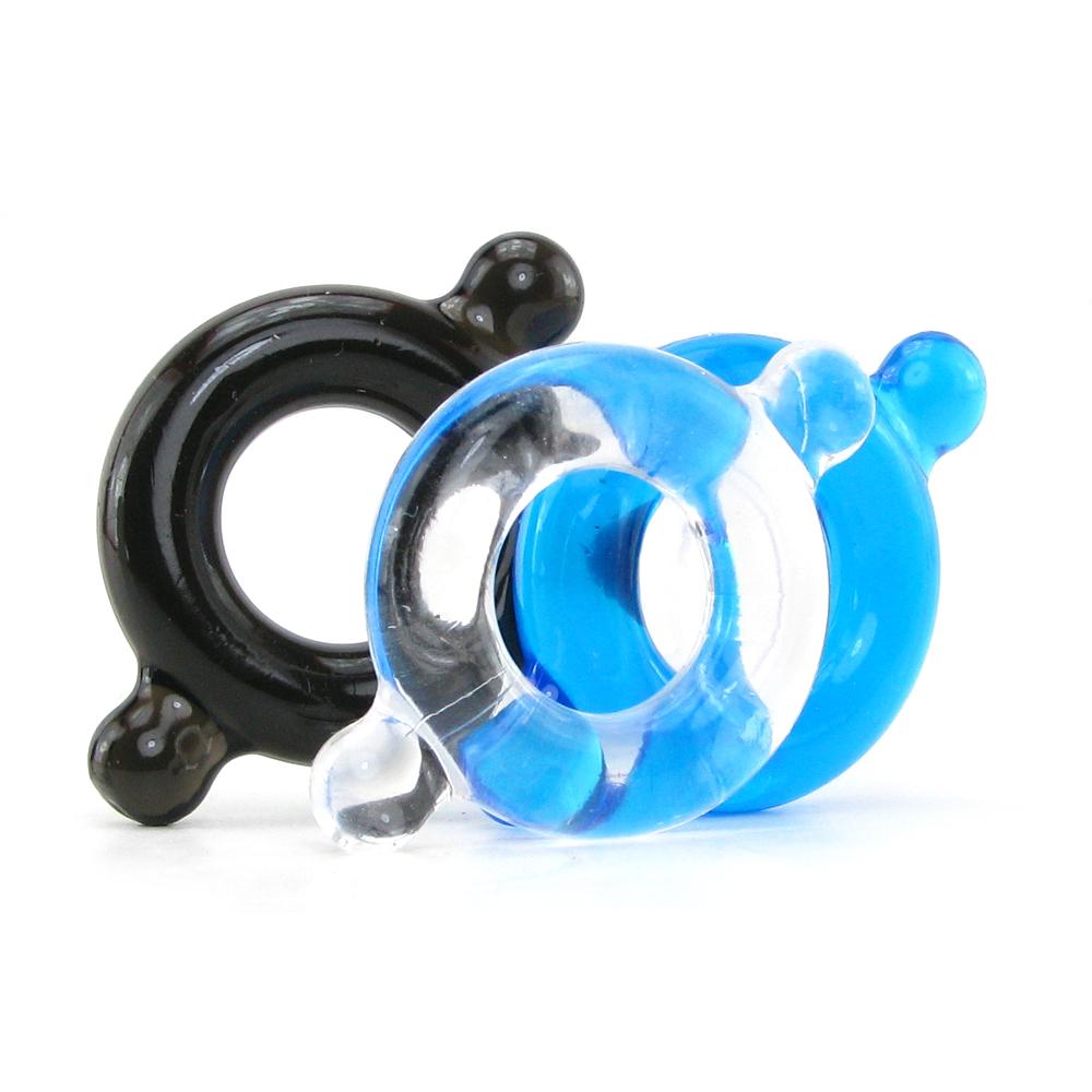 Black and blue elastomer cock rings on a white background.