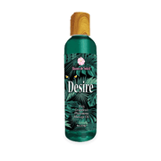 Green bottle of Desire Pheromone Massage Oil with a wooden cap and tropical leaf label.