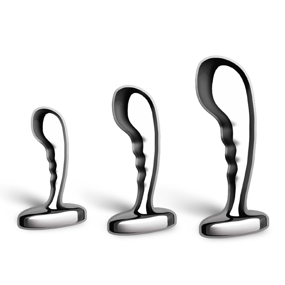 Three stainless steel prostate training plugs of varying sizes.