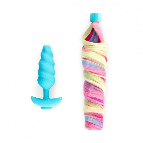 A blue vibrating unicorn anal plug with a rainbow tail.
