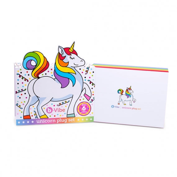 A vibrating unicorn anal plug set with a rainbow tail.