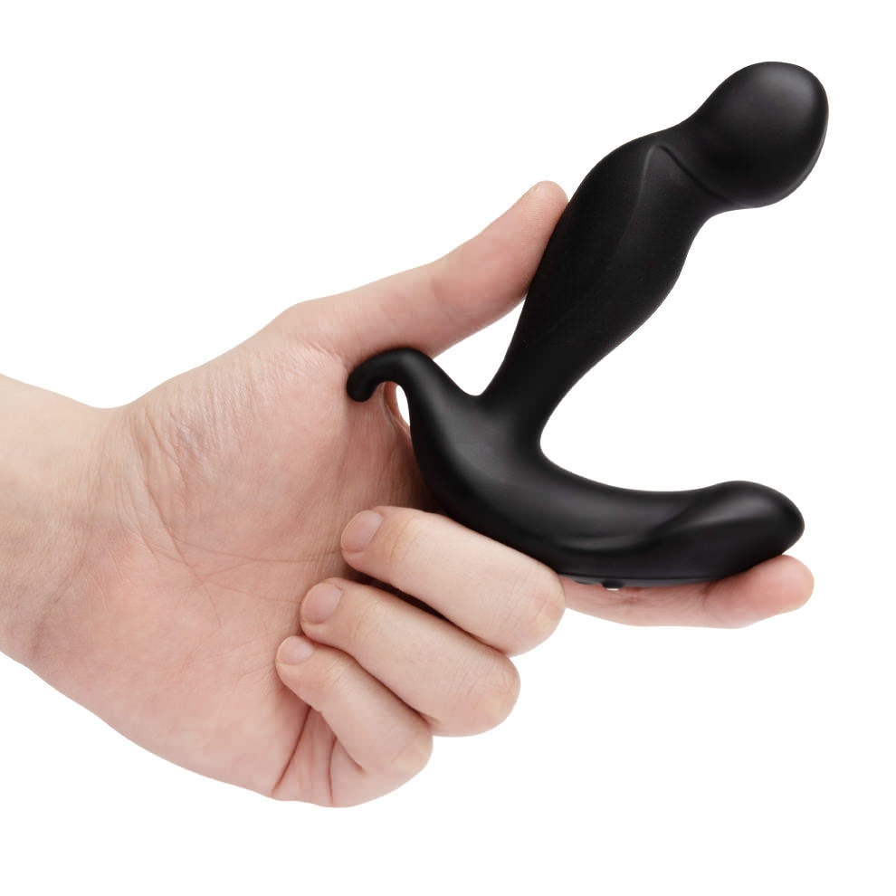 Black silicone prostate plug with a curved handle held in a hand.