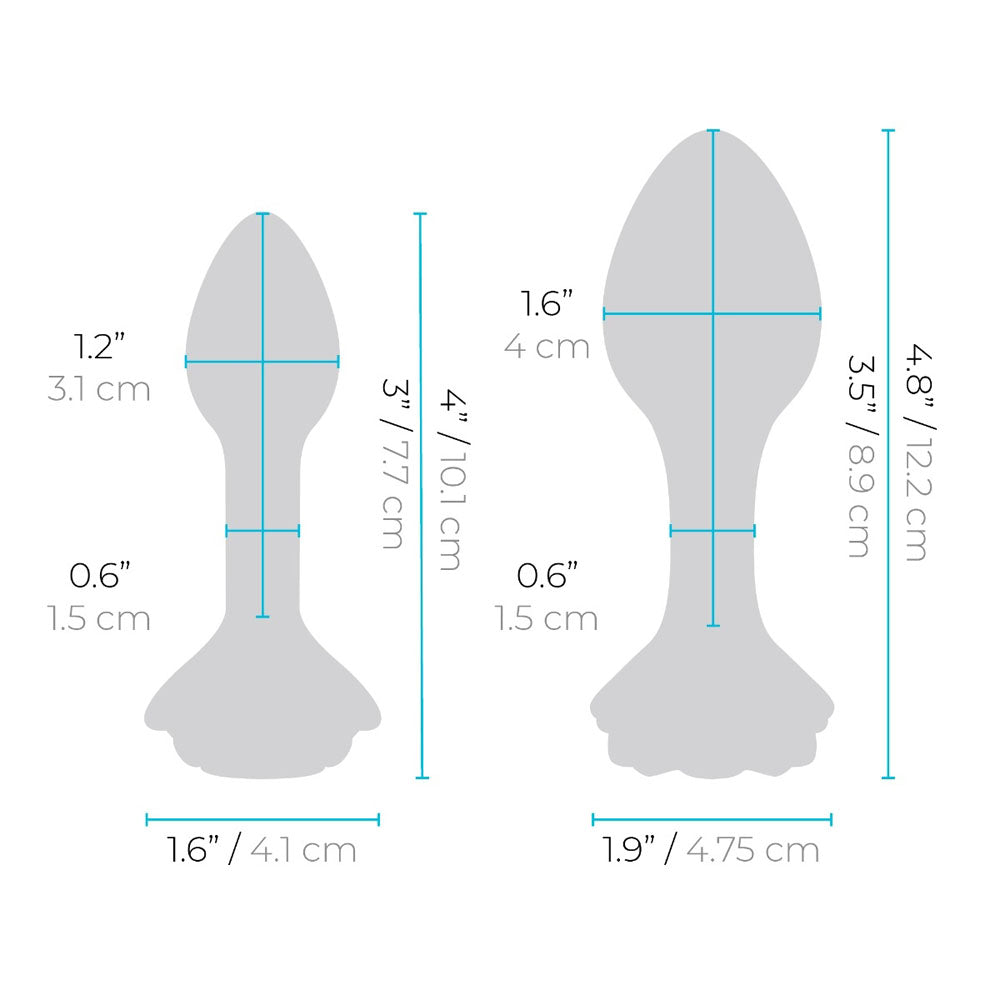 Two pink glass butt plugs with rose details and graduated sizes.