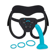 Black harness set with a blue silicone dildo and three rings.
