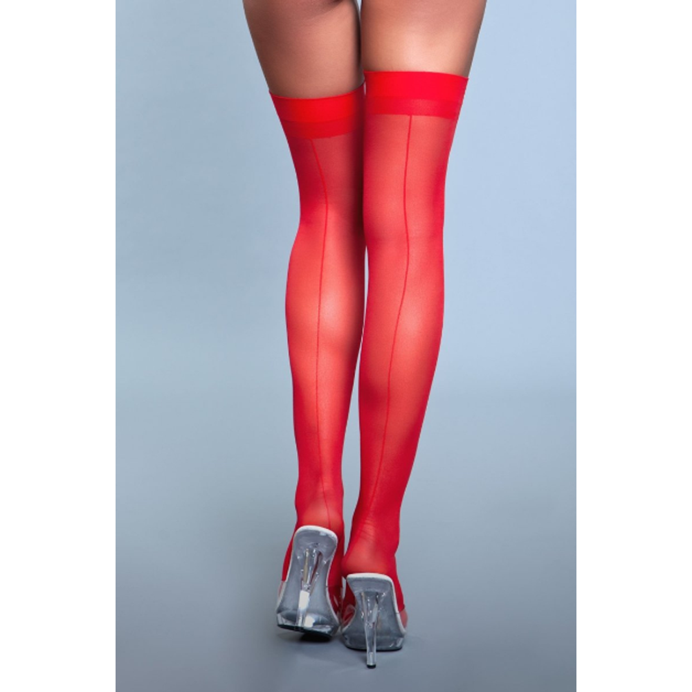 Sheer red thigh-high stockings with a back seam and clear heels.